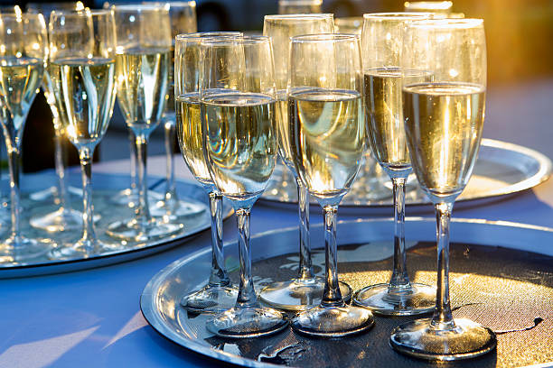 istock Glasses full of champagne on a tray 540109710