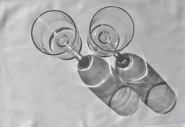 istock Two Wine glasses and Their Shadows in Sunlight 540110946
