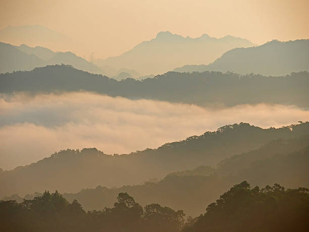 istock Golden clouds above the mountain in breaking dawn 540111152
