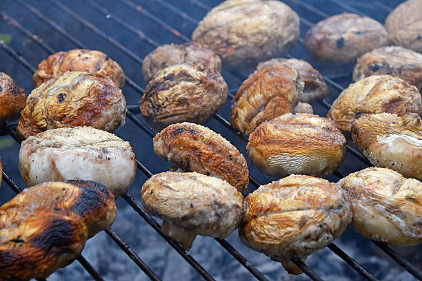 istock White champignons mushrooms on grill 540112800