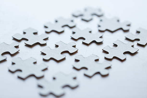 istock close up of puzzle pieces on table 540113602