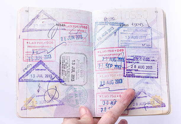 istock Opened passport with visa stamps on the pages 540114504