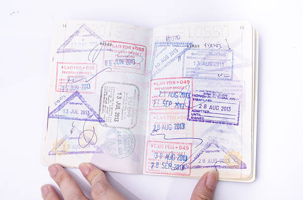 istock Opened passport with visa stamps on the pages 540114606