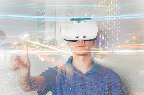 istock Asian man with VR headset and city backgorund 540114676