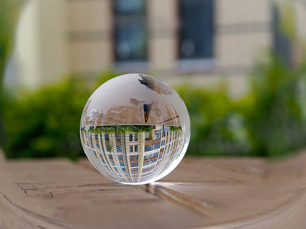 istock The transparent glass bowl reflected buildings. 540115500