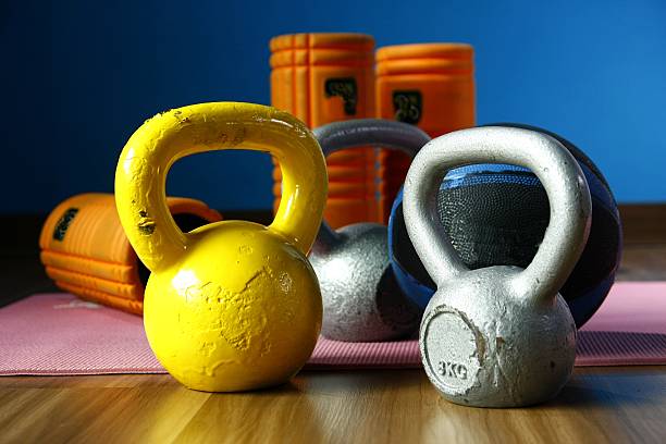 Assorted gym or exercise equipments stock photo