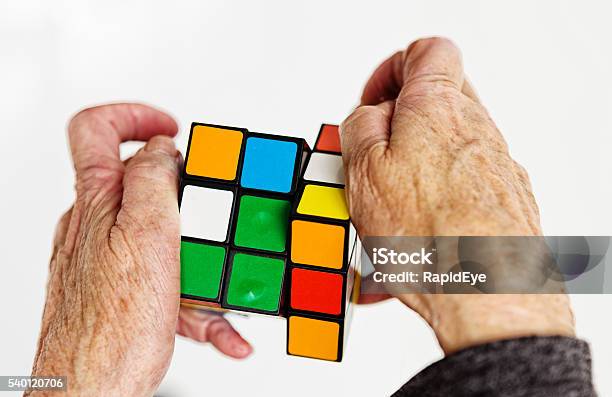 Rubiks Cube Editorial Handling Old Retirement Puzzle Hands Seniors Aging Stock Photo - Download Image Now
