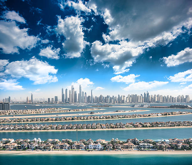 istock the palm jumeirah in Dubai with skyline 540120762