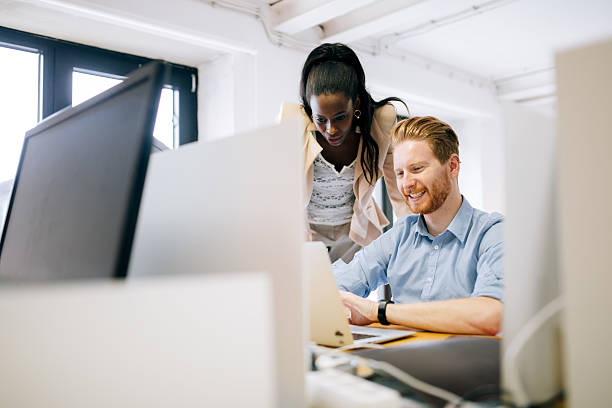 istock Busiensswoman advising colleague 540121108
