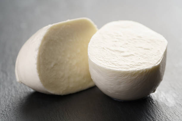 istock sliced mozarella ball on slate background 540121450