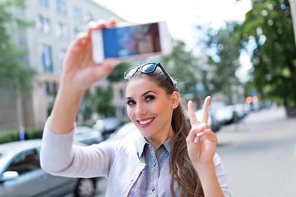 istock Woman taking a selfie with smartphone 540124936