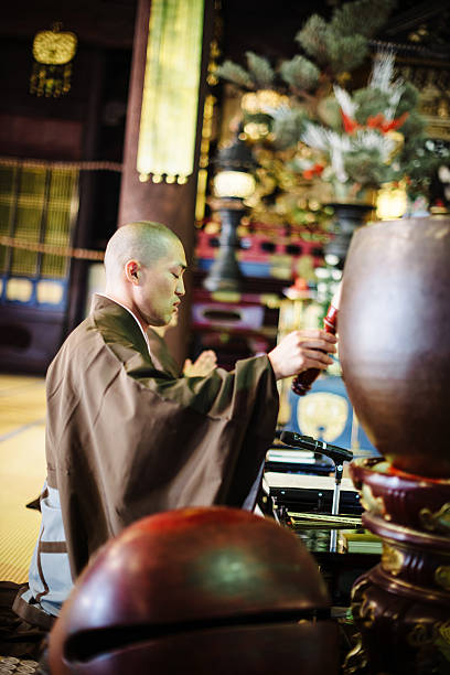 istock Monks during prayer in Buddhist shrine in Kyoto 540124984