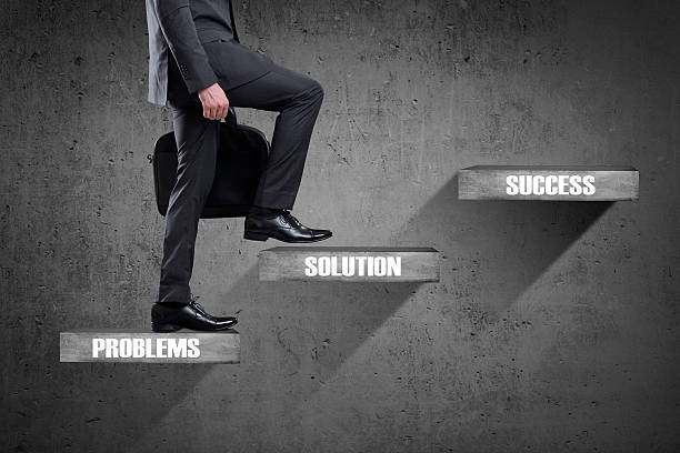 istock Businessman walking up staircase 540125314