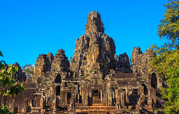 istock Ancient stone faces of Bayon temple, Angkor, Cambodia 540126538