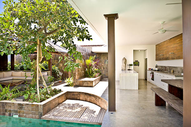 istock Outside patio area with trees in the garden and kitchen 540126630