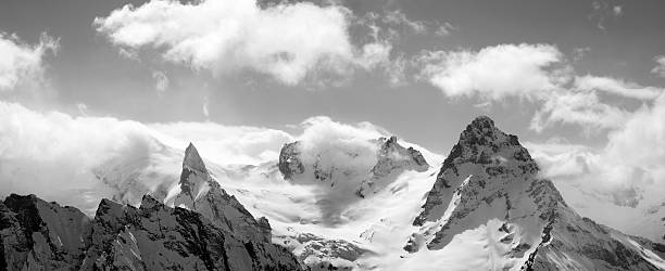 istock Black and white panorama mountains in cloud 540126928