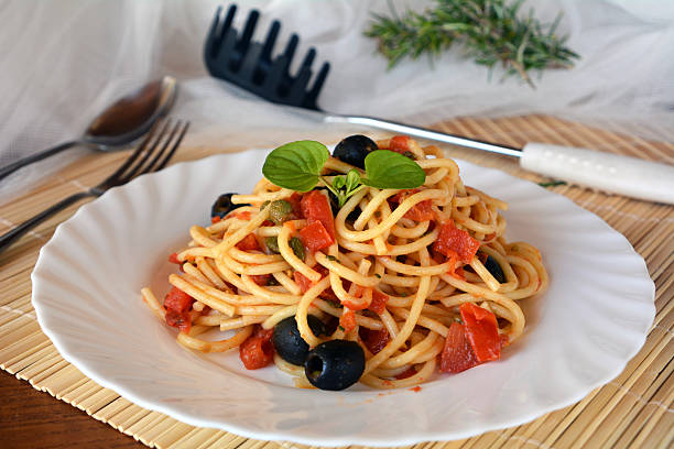 istock Spaghetti a la puttanesca on a bowl. Italian food. 540128064