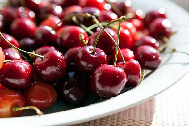 plate with cherry closeup
