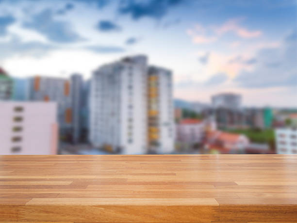 istock Empty wooden table and cityscape background 540195138