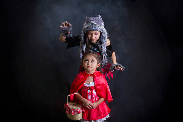 Wolf and little red riding hood locking eyes
