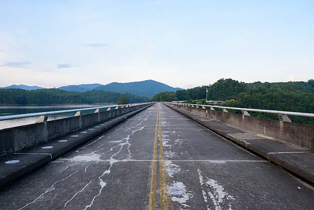 A two-lane road crosses the top of the 480-foot-high Fontana Dam, the highest dam in the TVA power system and the tallest dam east of the Rockies. It is located on the Little Tennessee River in North Carolina and was completed in 1944. The Appalachian Trail also crosses the dam.