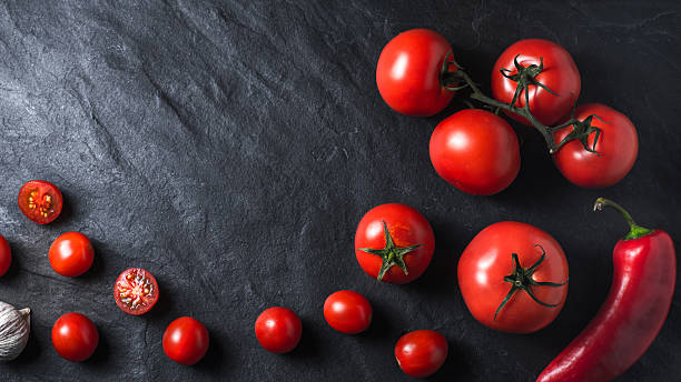 istock Ingredients for vegetable soup gazpacho on a black slate 540200540