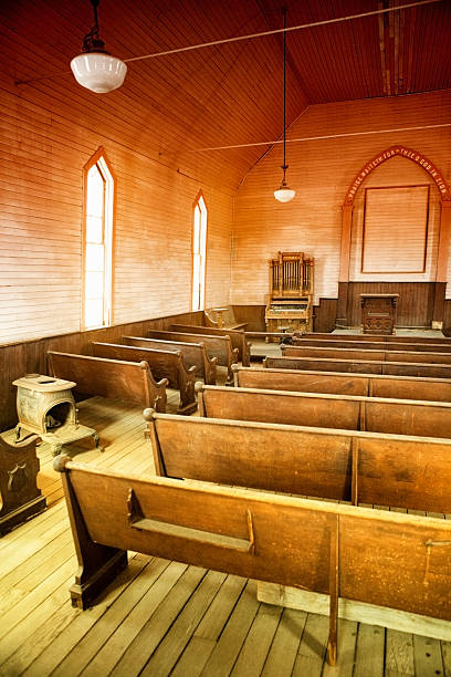 istock benches inside of a wooden church 540200874