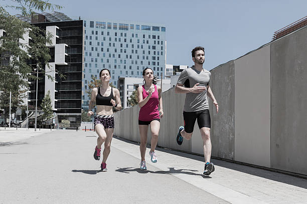 istock Group of young people running 540202088
