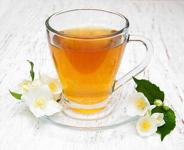 istock Cup of tea with jasmine flowers 540206028