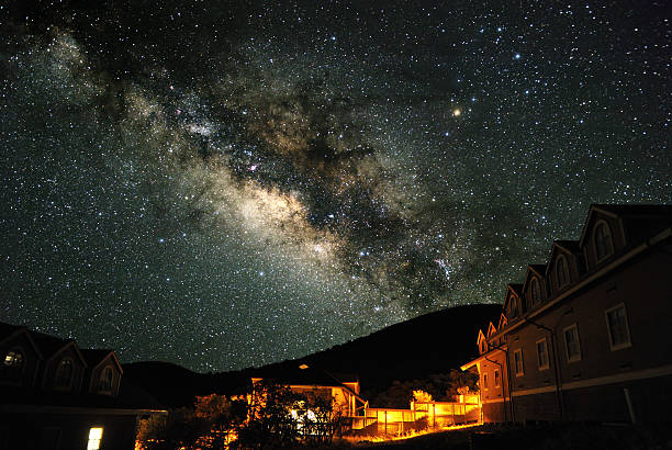 Lots of stars shining in the sky of the buildings with copy space.