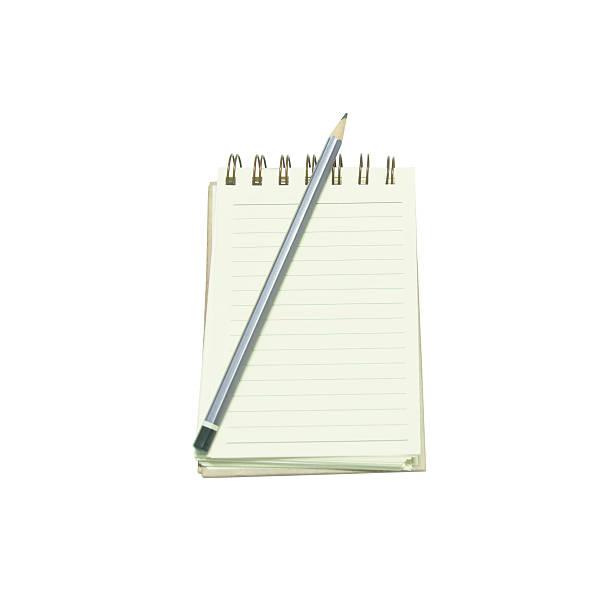 istock Notebook and pencil isolated on a white background. 540212076