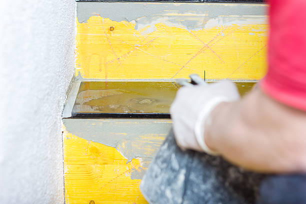 istock installing the surface of stairs with granite stone plates 540212748