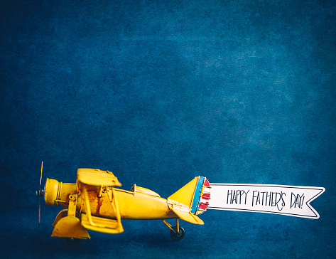 Happy Father's Day! Vintage airplane with handmade banner