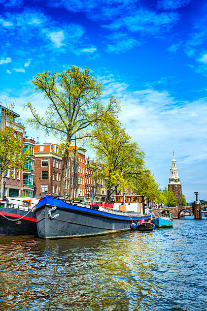 istock Amsterdam canal, Munttoren (tower) in Centrum 540216396