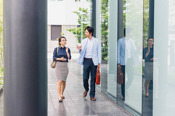 istock Japanese Business People Walking Outside on a Work Break 540216666