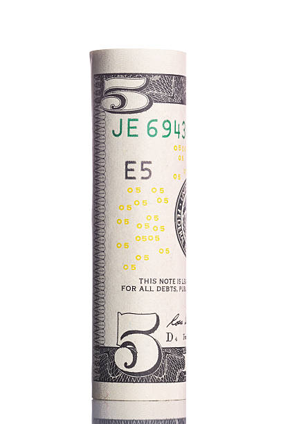 istock Roll of five usd banknote isolated on white background 540218246