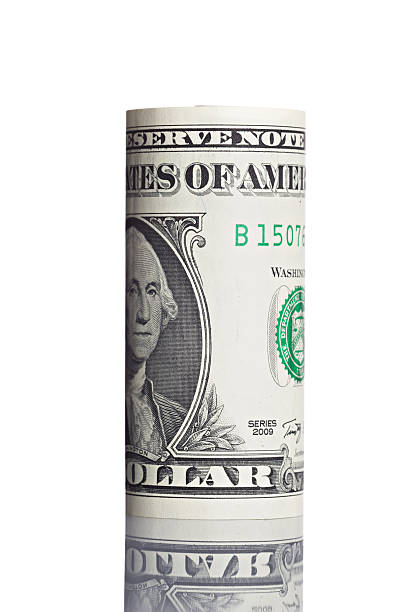 istock Roll of usd banknote isolated on white background 540218324