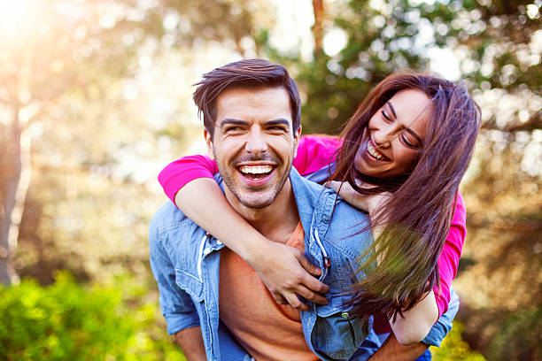 istock Happy romantic couple piggyback 540219002