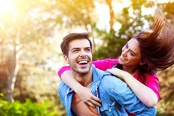 istock Happy romantic couple piggyback 540219030