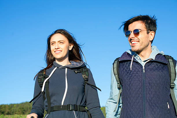 istock Young couple hiking on the mountain 540221526