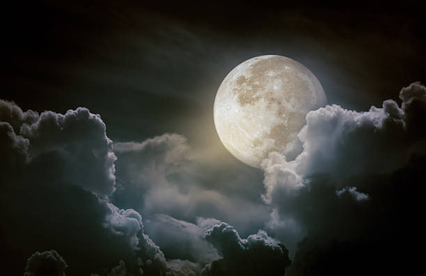 Nighttime sky with clouds. Beauty of nature and copy space.