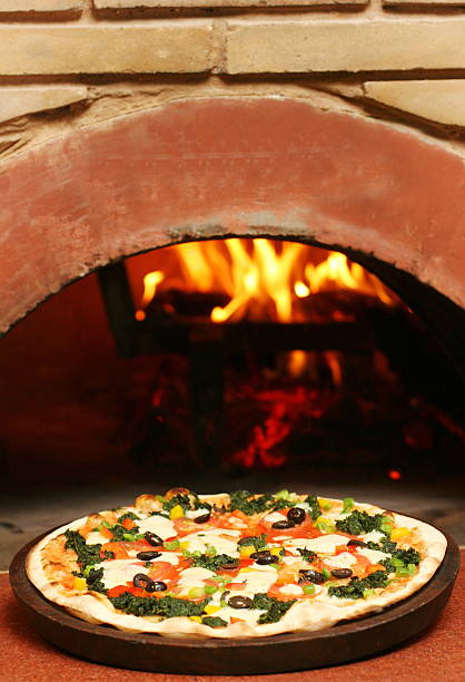 istock Pizza in a traditional oven 540229218