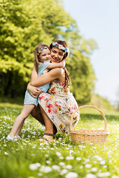 istock Embraced mother and daughter during spring day in nature. 540231158