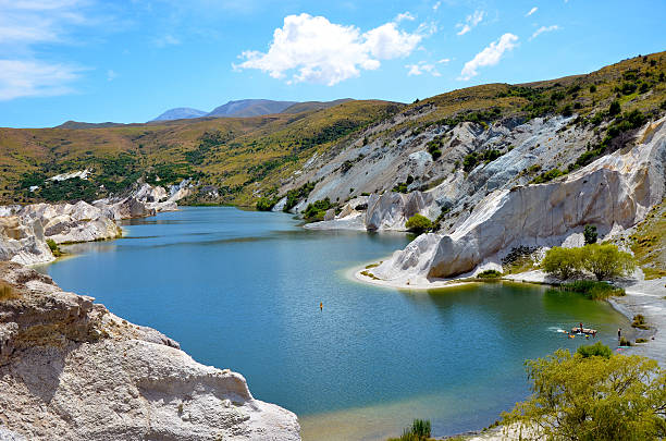 Blue lake and white cliffs, St Bathans, Otago, New Zealand