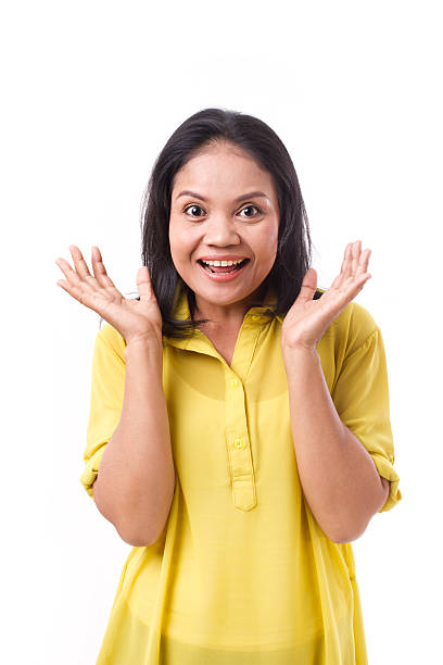 istock exited, happy middle aged woman isolated 540233032