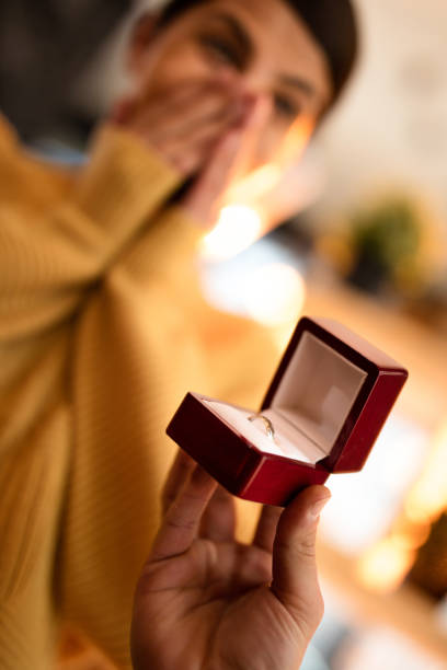 istock Close-up of man proposing his girlfriend with engagement ring. 540233126