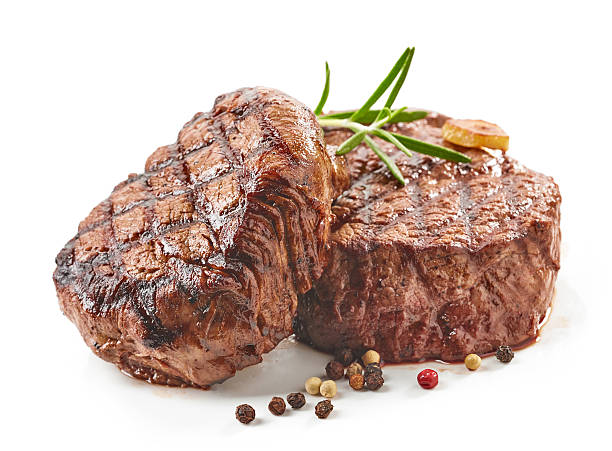 grilled beef steaks grilled beef steaks with spices isolated on white background main course stock pictures, royalty-free photos & images