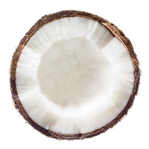 Сoconut. Half isolated on white background. Top view. Сoconut. Half isolated on white background. Top view. coconut milk photos stock pictures, royalty-free photos & images