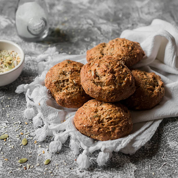 istock Multi seeds whole wheat buns on a grey stone background 540236318