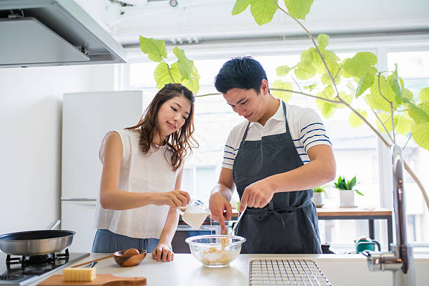 istock Young couple baking together in the kitchen 540237556